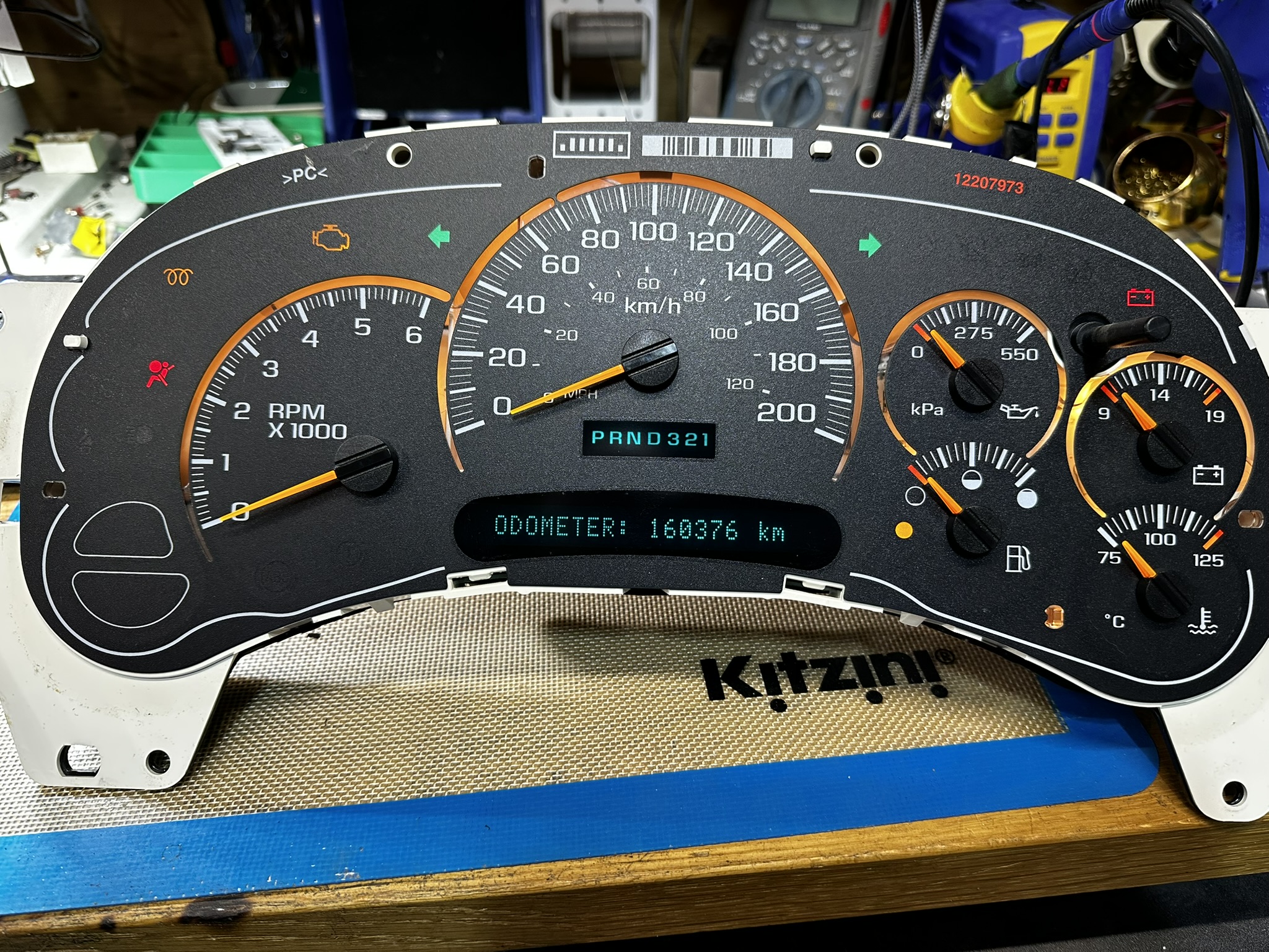 Instrument cluster opened for board-level diagnosis and repair